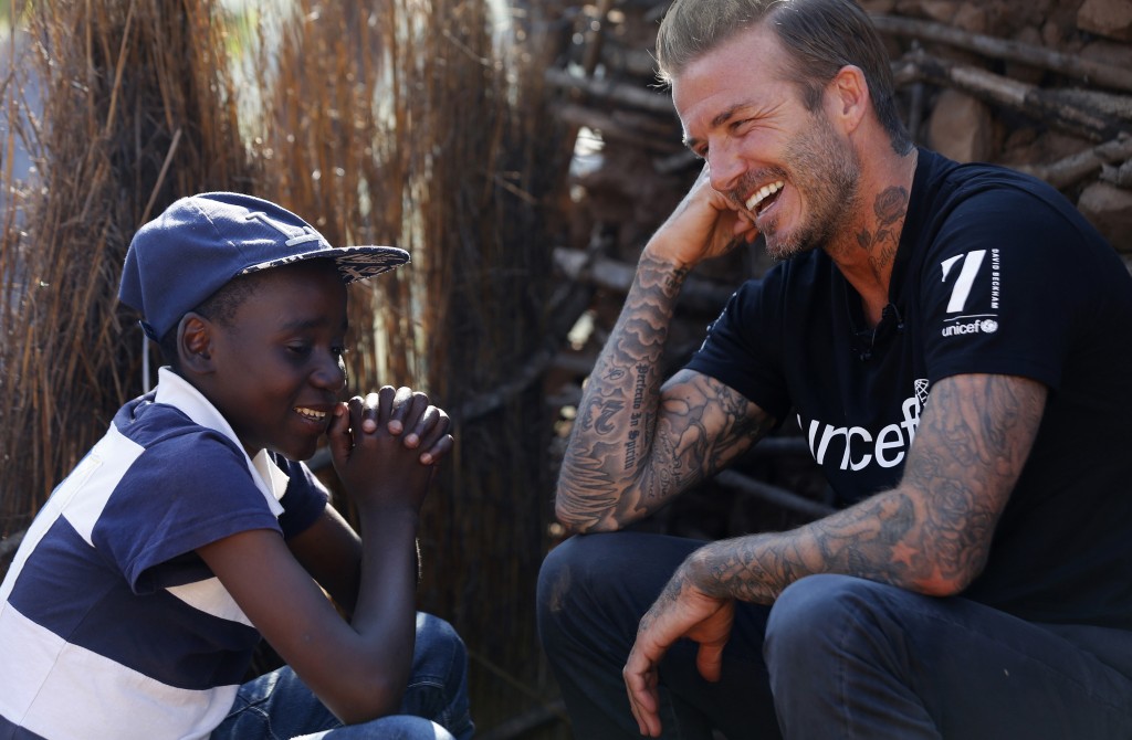 UNICEF Goodwill Ambassador David Beckham meets Sebenelle, 14, in Makhewu, Swaziland, on June 7, 2016, who receives the 7 Fund support in management of malnutrition in HIV positive children. Beckham travelled to Swaziland to see how 7: The David Beckham UNICEF Fund is helping UNICEF to provide life-saving treatment, care and support to HIV-positive children. During his visit Beckham learnt how the worst drought in decades – now taking hold on vast swathes of Eastern and Southern Africa – is threatening to wreak havoc on the lives of children and families already made vulnerable by HIV. Makhewu, Swaziland, June 7, 2016. © UNICEF/Swaziland/Modola16